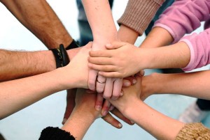 Hands supporting each other